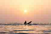Surfer in the sunset