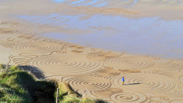 Sand art by Tony Plant on Watergate Bay beach