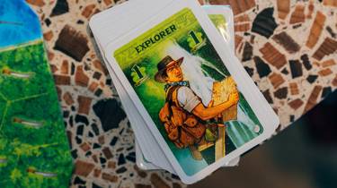 Explorer card on a board game