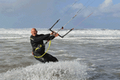 Carl kitesurfing in the shallows
