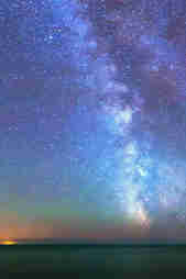 Aaron Jenkins - Starry night sky over the sea