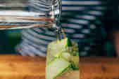 Fresh glass of Cucumber And Elderflower Cooler Cocktail