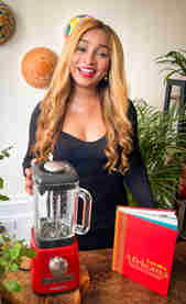Lerato with a blender and Africana cookbook