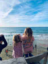 Allergy Badge children looking at Watergate Bay beach