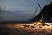 Barbecue on the beach nightime