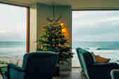 The Ocean Room Christmas tree with the view of the surf